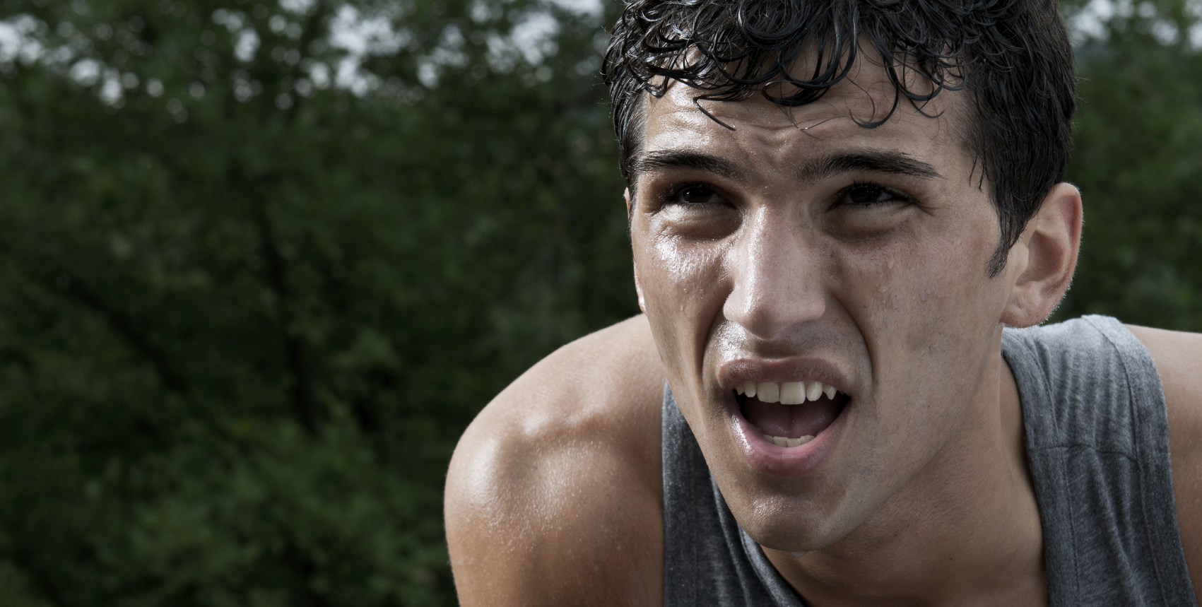 Exhausted runner taking a breath - Running workouts
